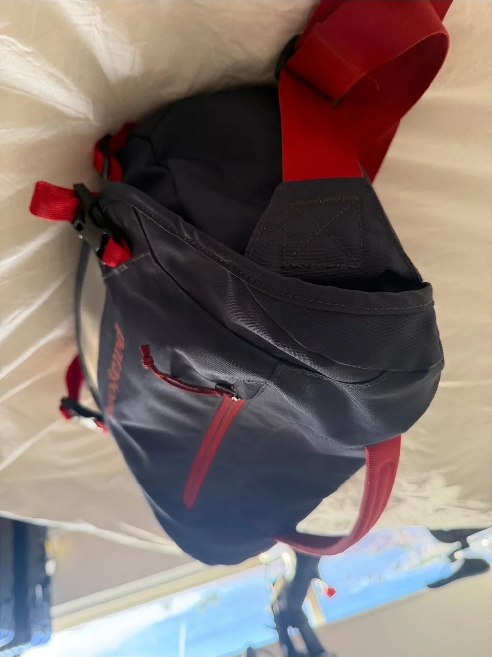 Rare almost new Patagonia gray and Red mini messenger Bag with Reflective Panel